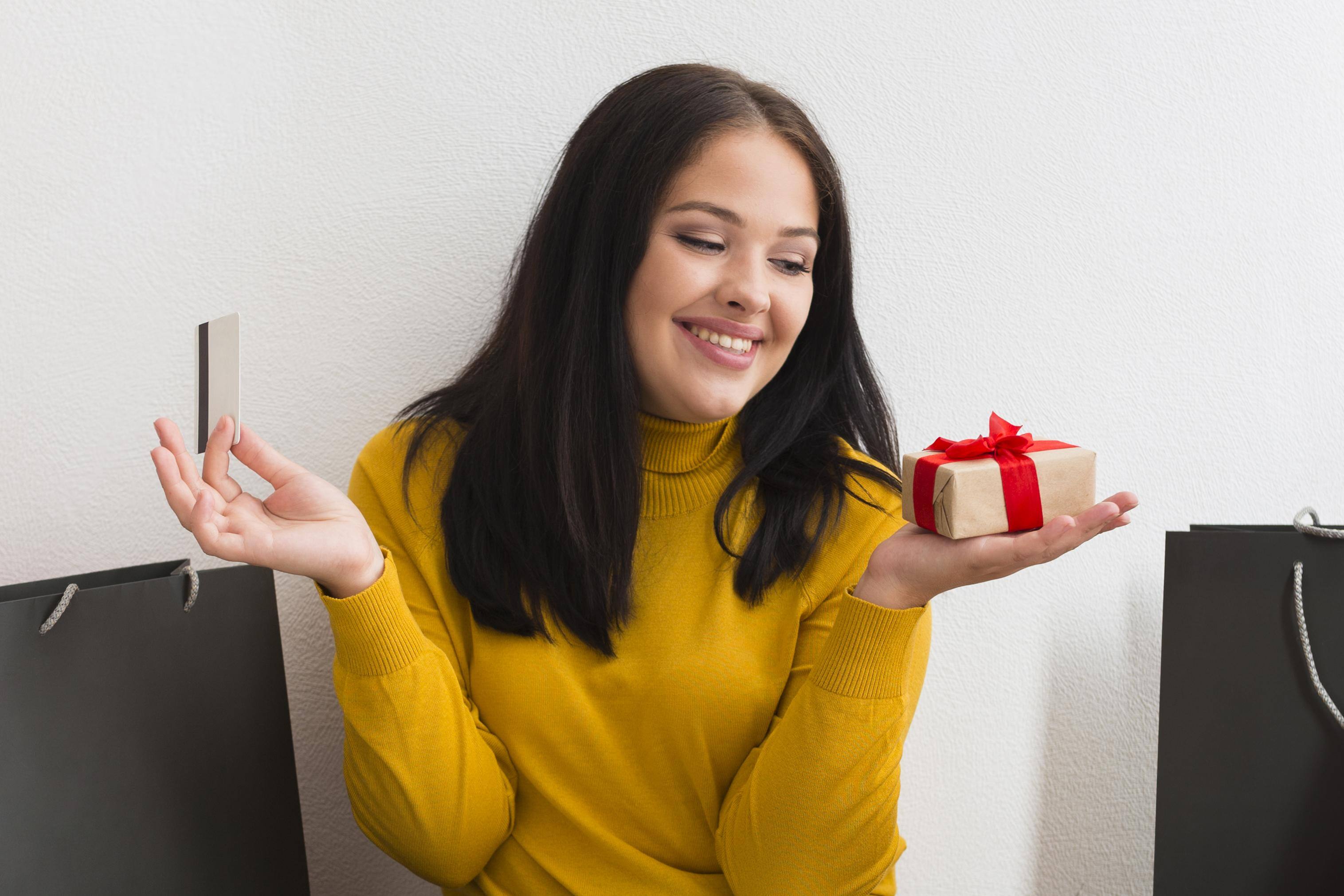 woman-holding-little-gift-package